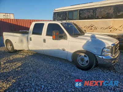 Czwarte zdjęcie samochodu z boku: 2001 FORD F350 SUPER DUTY VIN:1FTWW32F31EA02941 - miniatura