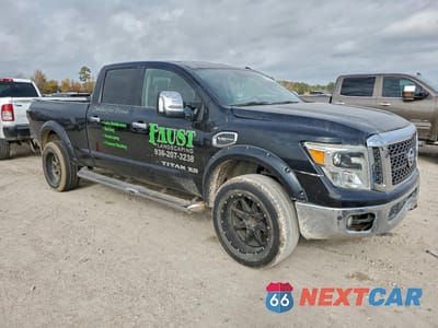 Czwarte zdjęcie samochodu z boku: 2016 NISSAN TITAN XD SL VIN:1N6AA1F21GN508326 - miniatura
