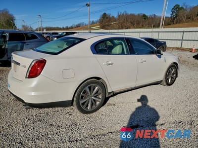Trzecie zdjęcie samochodu z tyłu: 2011 LINCOLN MKS VIN:1LNHL9DR2BG614867 - miniatura