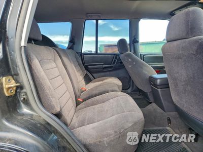 Zdjęcie 11 z 13 samochodu: 1997 JEEP GRAND CHEROKEE LAREDO VIN:1J4GZ58S6VC531856 - miniatura