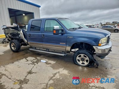 Czwarte zdjęcie samochodu z boku: 2004 FORD F350 SRW SUPER DUTY VIN:1FTSW31PX4EC54683 - miniatura