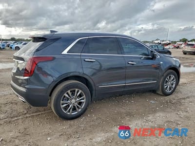 Trzecie zdjęcie samochodu z tyłu: 2022 CADILLAC XT5 PREMIUM LUXURY VIN:1GYKNCRS4NZ131364 - miniatura