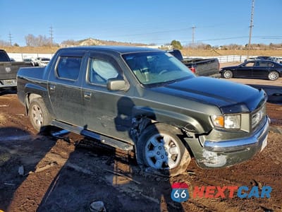 Czwarte zdjęcie samochodu z boku: 2006 HONDA RIDGELINE RTS VIN:2HJYK16486H502008 - miniatura