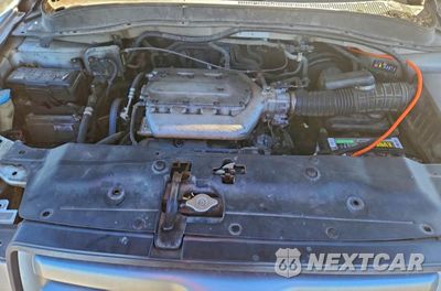 Zdjęcie 11 z 14 samochodu: 2005 HONDA PILOT EXL VIN:5FNYF18525B004826 - miniatura