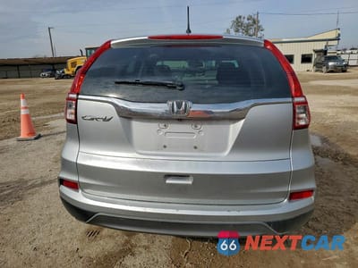 Zdjęcie 6 z 13 samochodu: 2015 HONDA CR-V LX VIN:3CZRM3H34FG714031 - miniatura