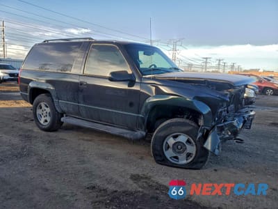 Czwarte zdjęcie samochodu z boku: 1998 CHEVROLET TAHOE K1500 VIN:3GNEK18RXWG123972 - miniatura