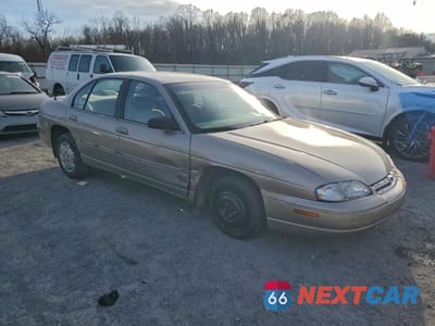 Czwarte zdjęcie samochodu z boku: 1999 CHEVROLET LUMINA BASE VIN:2G1WL52MXX9203128 - miniatura