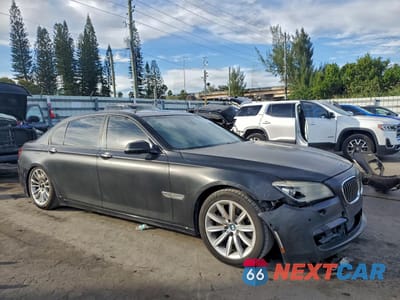 Czwarte zdjęcie samochodu z boku: 2015 BMW 750 LI VIN:WBAYE8C55FD782076 - miniatura