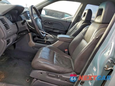 Zdjęcie 7 z 13 samochodu: 2003 HONDA PILOT EXL VIN:2HKYF18633H514531 - miniatura