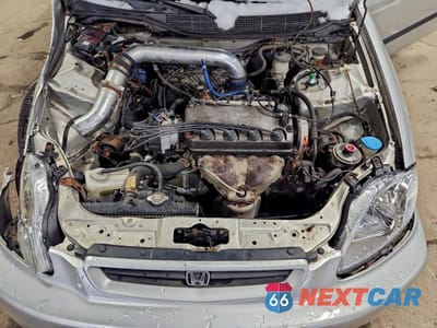 Zdjęcie 11 z 12 samochodu: 1998 HONDA CIVIC DX VIN:1HGEJ6128WL020057 - miniatura