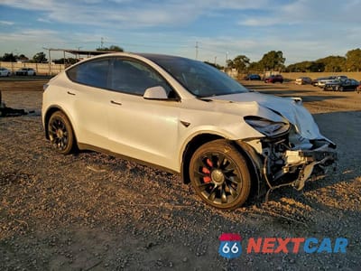 Czwarte zdjęcie samochodu z boku: 2021 TESLA MODEL Y VIN:5YJYGDED1MF125923 - miniatura
