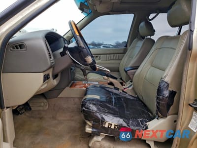 Zdjęcie 7 z 14 samochodu: 2002 INFINITI QX4 VIN:JNRDR09X02W212078 - miniatura