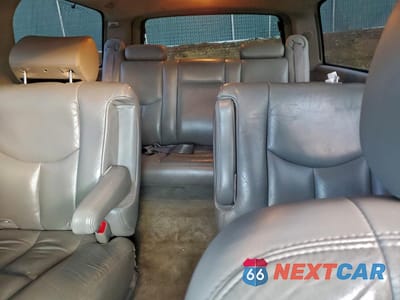 Zdjęcie 10 z 14 samochodu: 2004 CADILLAC ESCALADE ESV VIN:3GYFK66N54G302499 - miniatura