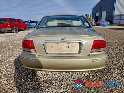 Zdjęcie 6 z 11 samochodu: 2002 HYUNDAI SONATA BASE VIN:KMHWF25S42A668777 - miniatura
