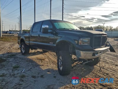 Czwarte zdjęcie samochodu z boku: 2006 FORD F350 SRW SUPER DUTY VIN:1FTWW31P36ED57187 - miniatura
