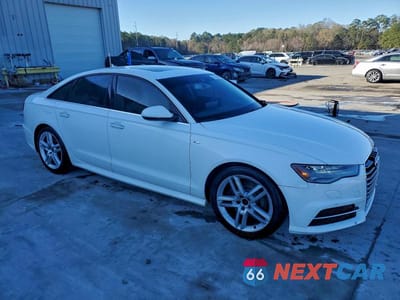 Czwarte zdjęcie samochodu z boku: 2016 AUDI A6 PRESTIGE VIN:WAUHMAFC7GN003647 - miniatura