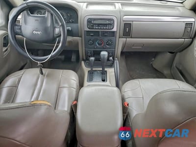 Zdjęcie 8 z 13 samochodu: 2003 JEEP GRAND CHEROKEE LAREDO VIN:1J8GW48S93C556717 - miniatura