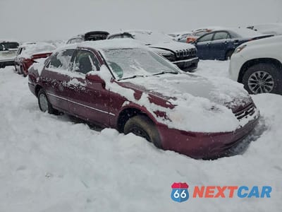 Czwarte zdjęcie samochodu z boku: 1998 TOYOTA CAMRY LE VIN:4T1BG22K1WU354105 - miniatura