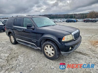 Czwarte zdjęcie samochodu z boku: 2004 LINCOLN AVIATOR VIN:5LMEU68HX4ZJ03864 - miniatura