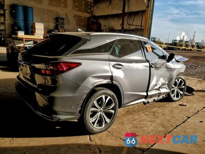 Trzecie zdjęcie samochodu z tyłu: 2021 LEXUS RX 350 VIN:2T2HZMAA0MC196259 - miniatura
