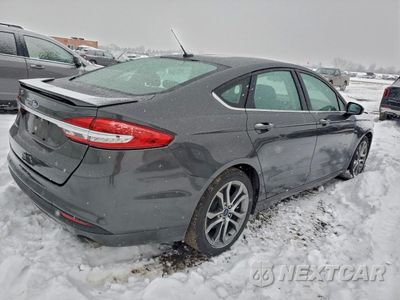 Trzecie zdjęcie samochodu z tyłu: 2017 FORD FUSION S VIN:3FA6P0G70HR311485 - miniatura