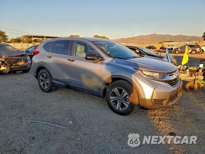 Czwarte zdjęcie samochodu z boku: 2018 HONDA CR-V LX VIN:2HKRW5H30JH400274 - miniatura