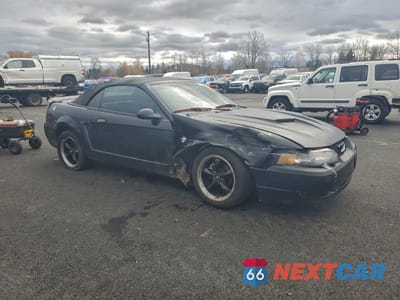 Czwarte zdjęcie samochodu z boku: 1999 FORD MUSTANG GT VIN:1FAFP45X7XF133421 - miniatura