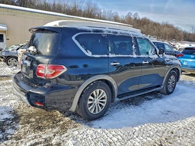 Trzecie zdjęcie samochodu z tyłu: 2017 NISSAN ARMADA SV VIN:JN8AY2NCXH9503543 - miniatura