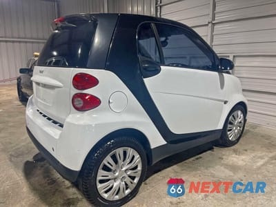 Czwarte zdjęcie samochodu z boku: 2012 SMART FORTWO PURE VIN:WMEEJ3BA5CK540092 - miniatura