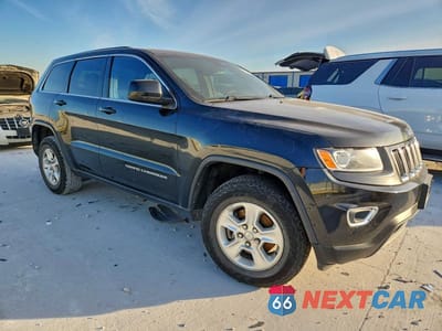 Czwarte zdjęcie samochodu z boku: 2014 JEEP GRAND CHEROKEE LAREDO VIN:1C4RJFAG0EC249391 - miniatura