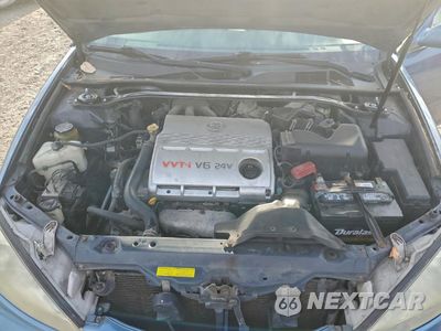 Zdjęcie 11 z 14 samochodu: 2003 TOYOTA CAMRY LE VIN:4T1BF32K63U565885 - miniatura