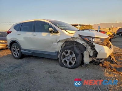Czwarte zdjęcie samochodu z boku: 2018 HONDA CR-V EX VIN:2HKRW1H53JH521150 - miniatura