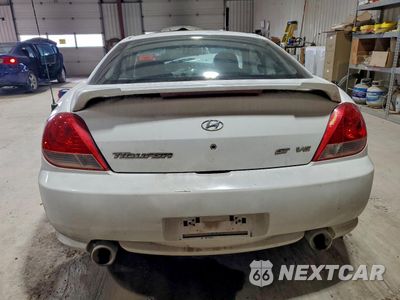 Zdjęcie 6 z 12 samochodu: 2006 HYUNDAI TIBURON GT VIN:KMHHN65F26U230821 - miniatura