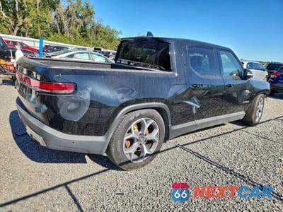 Trzecie zdjęcie samochodu z tyłu: 2022 RIVIAN R1T ADVENTURE VIN:7FCTGAAAXNN015177 - miniatura