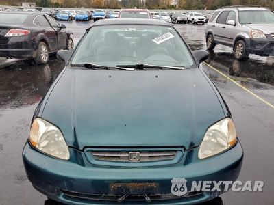 Piąte zdjęcie samochodu w środku: 1998 HONDA CIVIC DX VIN:1HGEJ6124WL000341 - miniatura