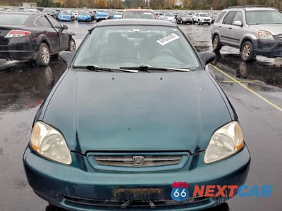 Piąte zdjęcie samochodu w środku: 1998 HONDA CIVIC DX VIN:1HGEJ6124WL000341 - miniatura