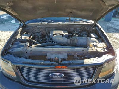 Zdjęcie 11 z 12 samochodu: 2000 FORD F150 VIN:2FTRX07LXYCB16135 - miniatura