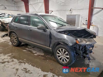 Czwarte zdjęcie samochodu z boku: 2011 VOLKSWAGEN TOUAREG V6 VIN:WVGFF9BP4BD006642 - miniatura