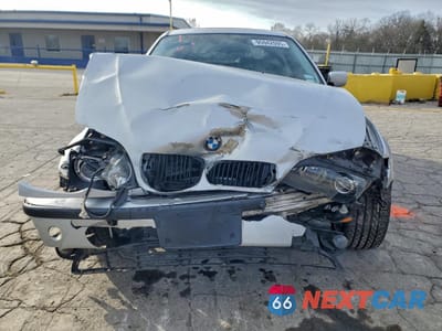 Piąte zdjęcie samochodu w środku: 2002 BMW 325 I VIN:WBAET37442NJ21656 - miniatura