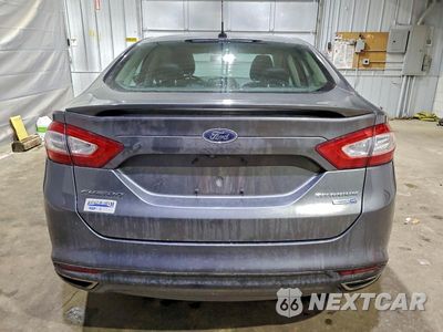 Zdjęcie 6 z 11 samochodu: 2014 FORD FUSION TITANIUM VIN:3FA6P0D92ER154124 - miniatura