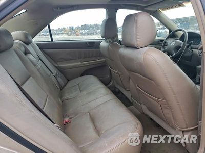Zdjęcie 10 z 11 samochodu: 2004 TOYOTA CAMRY LE VIN:4T1BE30K34U857713 - miniatura