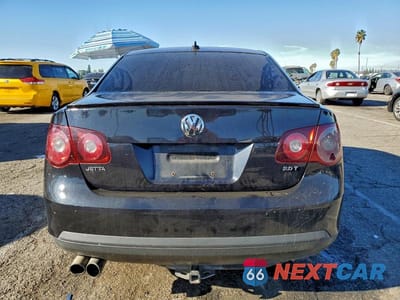 Zdjęcie 6 z 12 samochodu: 2010 VOLKSWAGEN JETTA WOLFSBURG VIN:3VWRA7AJ2AM151308 - miniatura