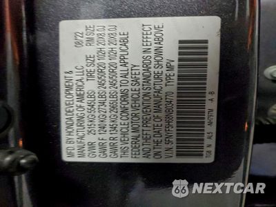 Zdjęcie 12 z 13 samochodu: 2022 HONDA PILOT TOURING VIN:5FNYF5H68NB034770 - miniatura
