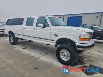 Czwarte zdjęcie samochodu z boku: 1997 FORD F350 VIN:1FTJW36F3VEA37540 - miniatura