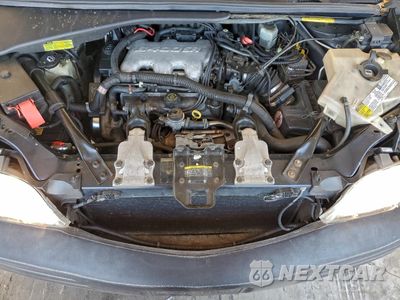 Zdjęcie 11 z 14 samochodu: 2002 PONTIAC MONTANA LUXURY VIN:1GMDX13E72D215537 - miniatura
