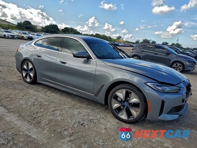 Czwarte zdjęcie samochodu z boku: 2024 BMW I4 EDRIVE 40 VIN:WBY73AW01RFR68281 - miniatura
