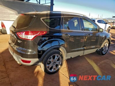 Trzecie zdjęcie samochodu z tyłu: 2016 FORD ESCAPE TITANIUM VIN:1FMCU9JXXGUA65101 - miniatura