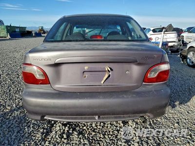 Zdjęcie 6 z 12 samochodu: 1999 HYUNDAI ACCENT GL VIN:KMHVF24NXXU560404 - miniatura