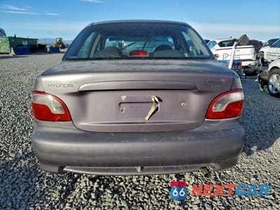 Zdjęcie 6 z 13 samochodu: 1999 HYUNDAI ACCENT GL VIN:KMHVF24NXXU560404 - miniatura