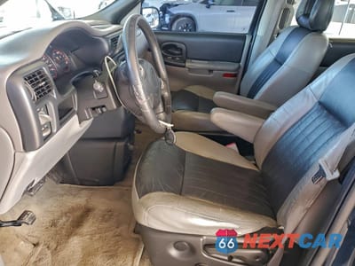 Zdjęcie 7 z 14 samochodu: 2002 PONTIAC MONTANA LUXURY VIN:1GMDX13E72D215537 - miniatura